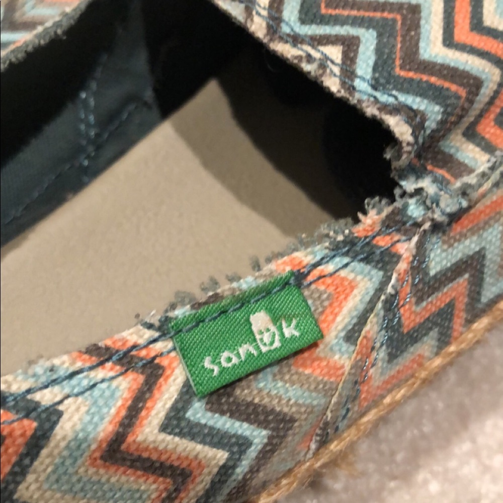 Sanuk shoes/ still lots of life left. GUC ..